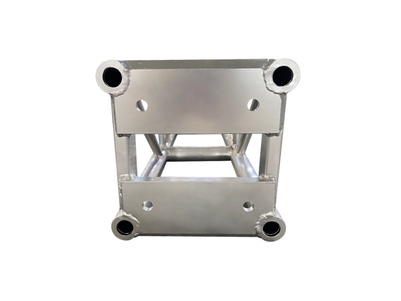 Precision CNC drilled bolt holes on a 12x12 inch aluminum truss plate Precision CNC drilled bolt holes on a 12x12 inch aluminum truss plate